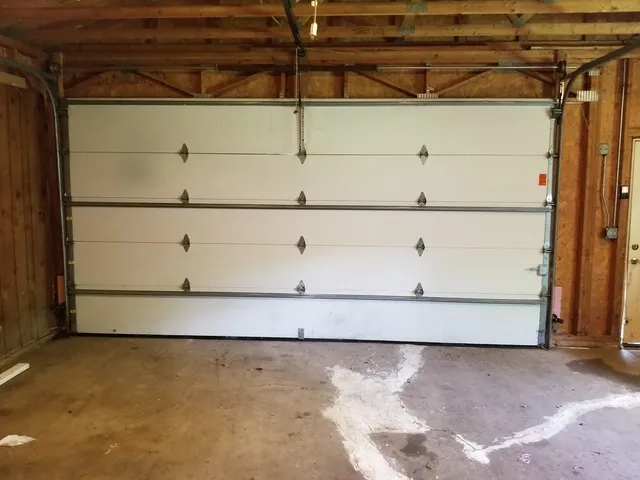 a view of a room with a wooden fence
