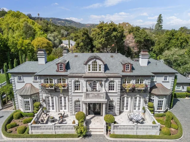 an outdoor view of a house with a outdoor space