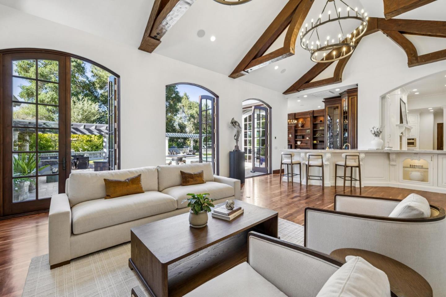15253 Montalvo Road Saratoga, CA 95070 - Photo 25 of 107 a living room with furniture and large windows