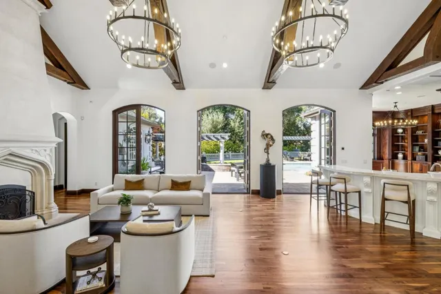 a view of balcony with wooden floor and outdoor seating