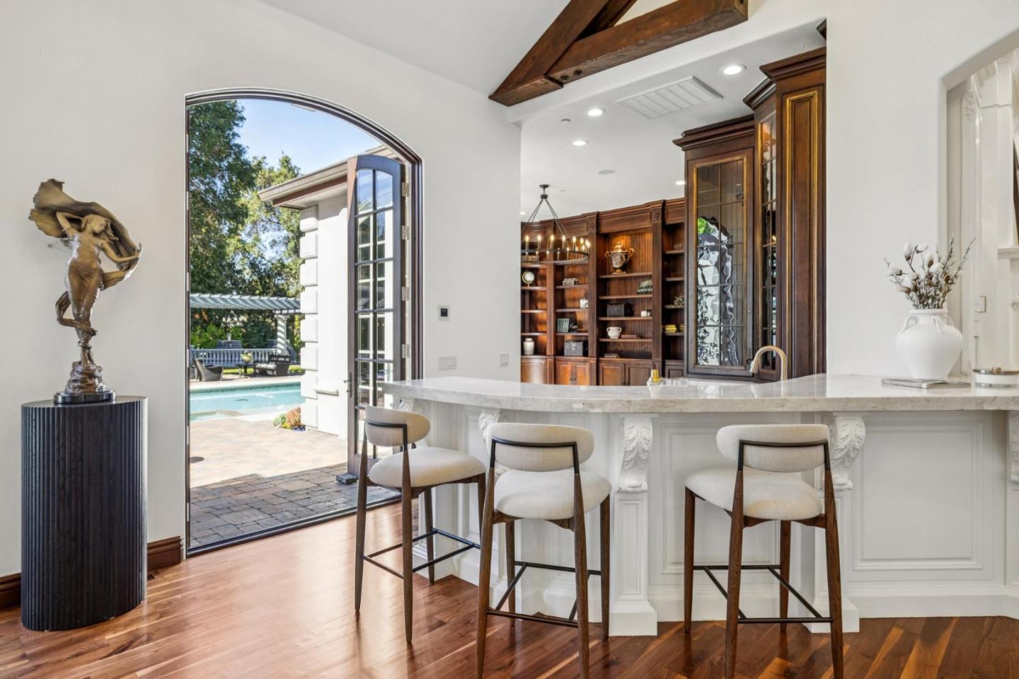 15253 Montalvo Road Saratoga, CA 95070 - Photo 27 of 104 a kitchen with a table and chairs in it