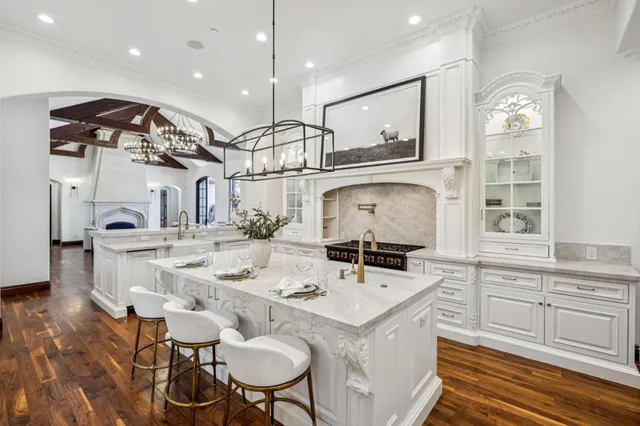 a front view of a house with fountain