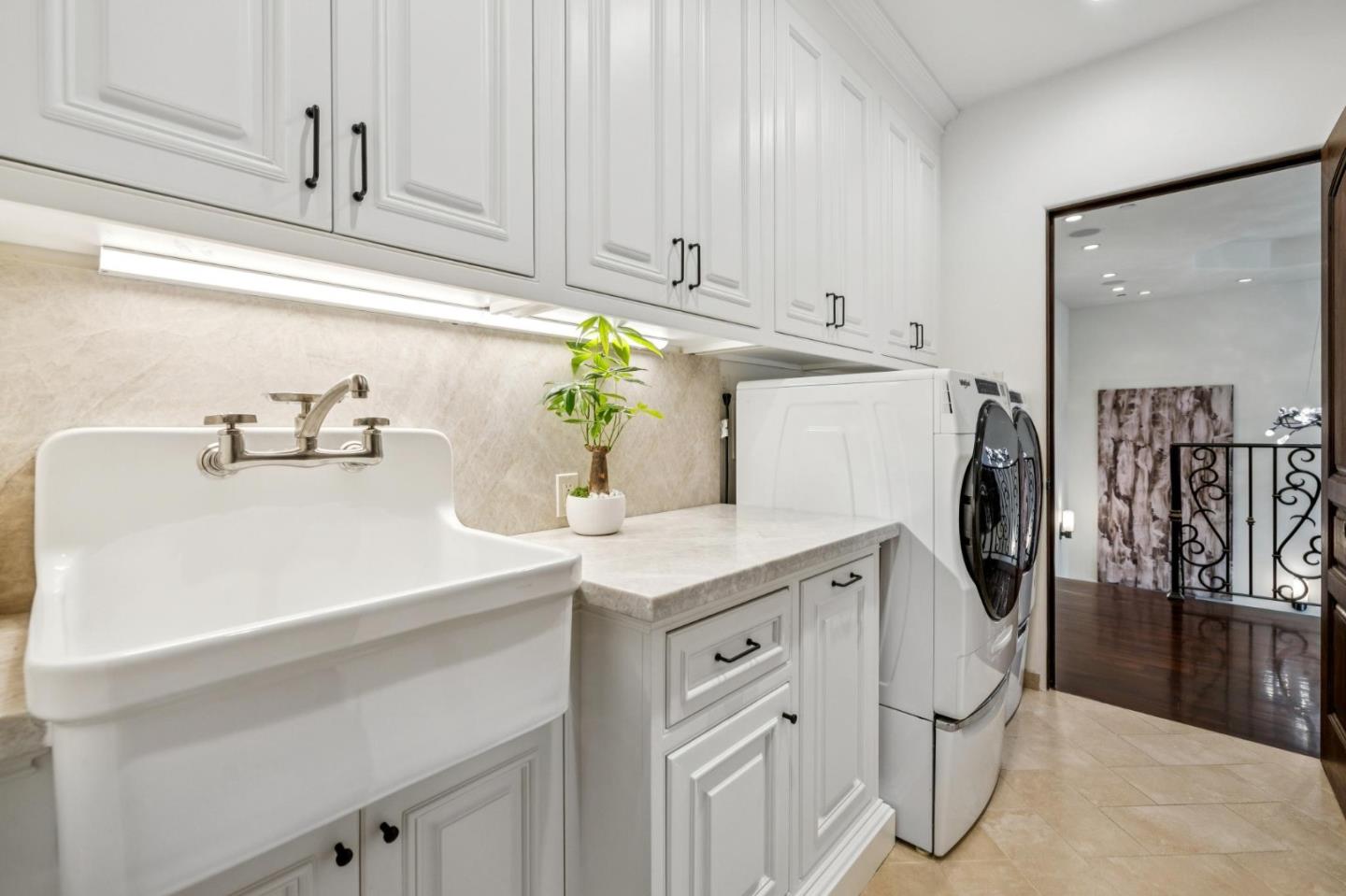 15253 Montalvo Road Saratoga, CA 95070 - Photo 50 of 107 a kitchen with stainless steel appliances a sink and cabinets