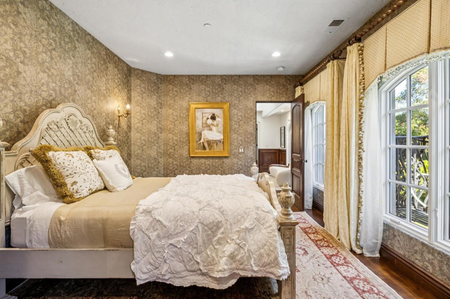 15253 Montalvo Road Saratoga, CA 95070 - Photo 63 of 107 a bedroom with a bed and wooden floor