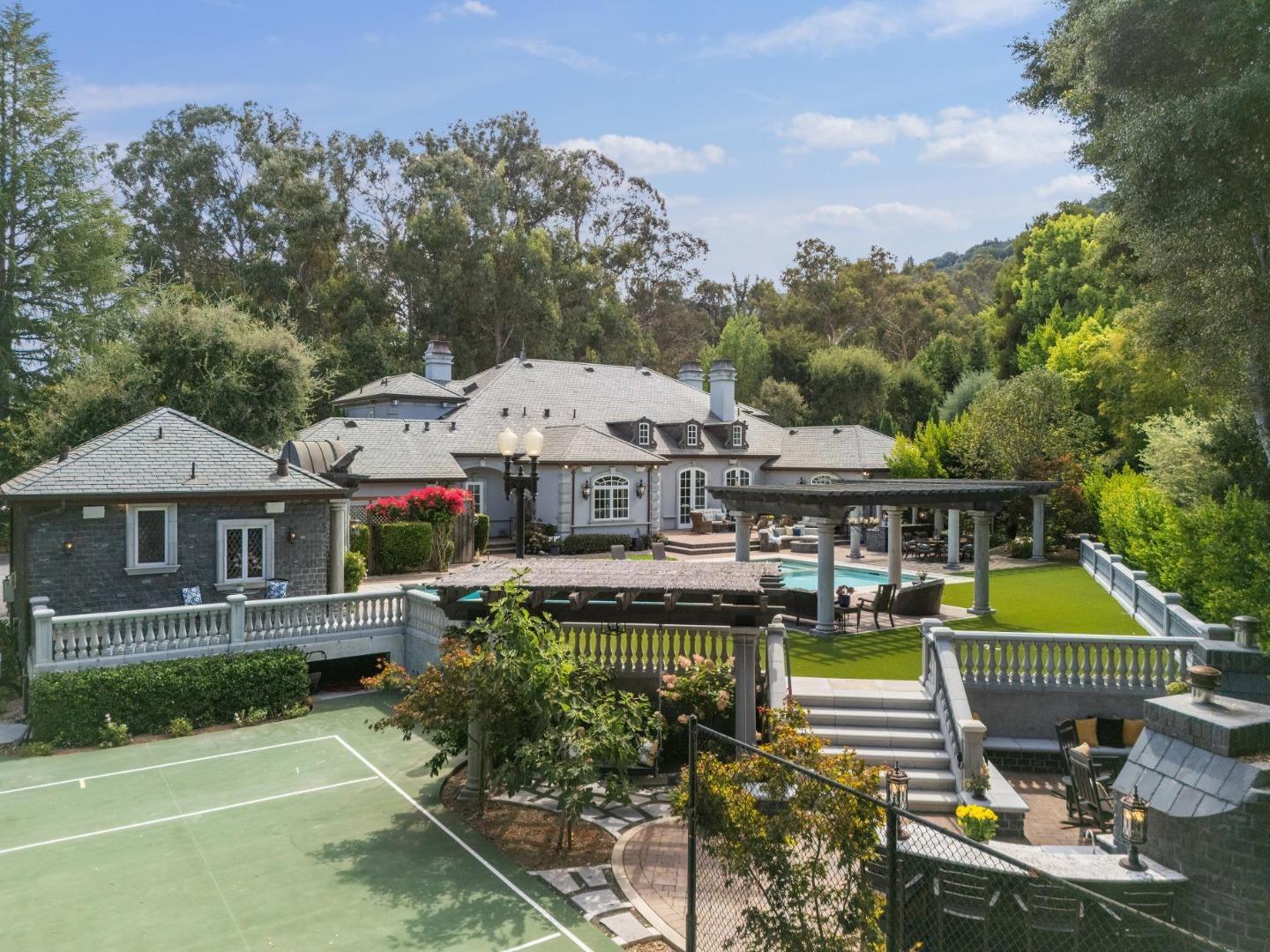 15253 Montalvo Road Saratoga, CA 95070 - Photo 90 of 104 an aerial view of a house with swimming pool and glass windows