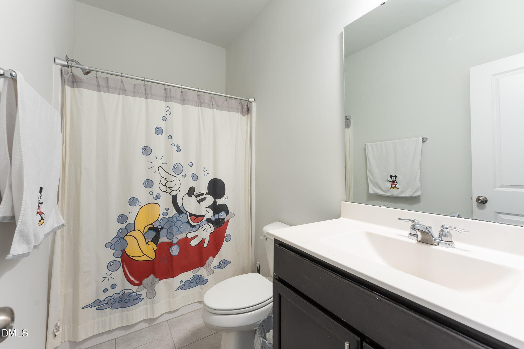 1296 Barn Cat Way Apex, NC 27502 - Photo 18 of 22 a bathroom with a sink toilet and shower