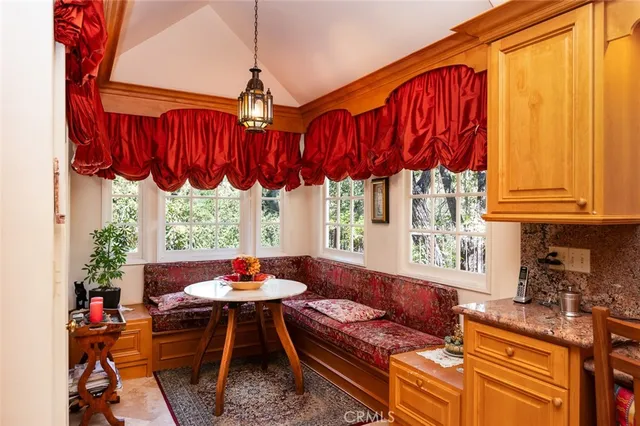 a living room with a rug and a rug