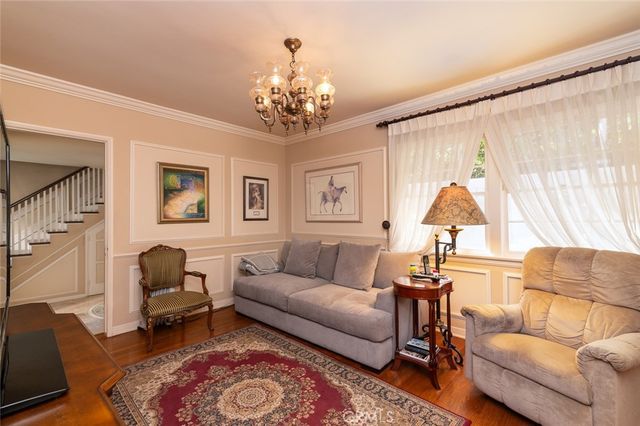 a view of entryway livingroom and hall