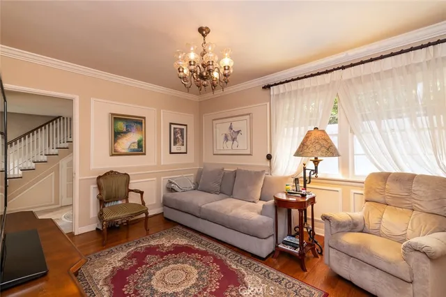 a view of entryway livingroom and hall