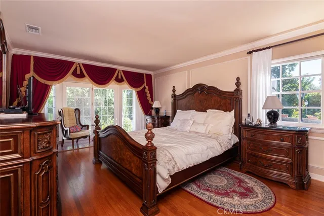 a view of a chairs and table in a room