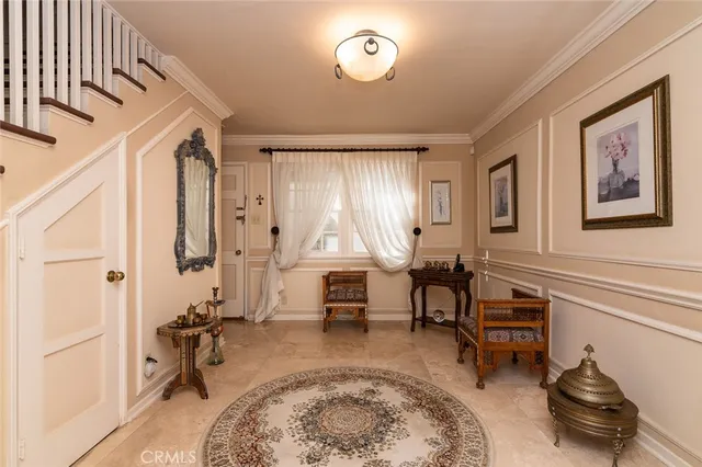 a bathroom with a double vanity sink a toilet a mirror and shower