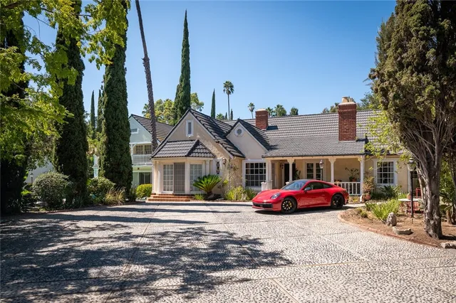 a car parked in front of a house