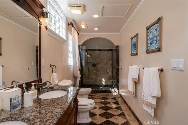 a view of a backyard with plants and outdoor seating