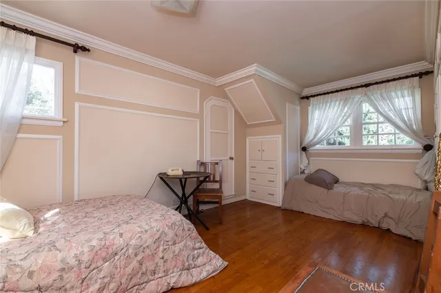 an aerial view of a house with a yard and garden