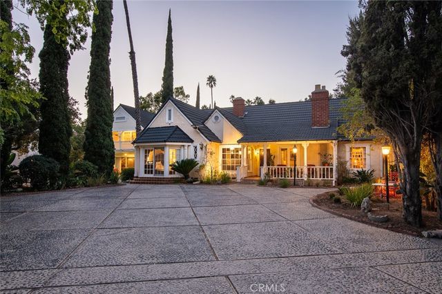 an aerial view of residential house and green space
