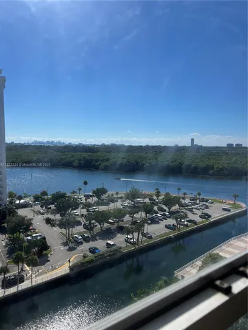 a view of wooden floor and bathroom