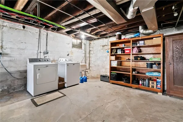 a storage room with washer and dryer