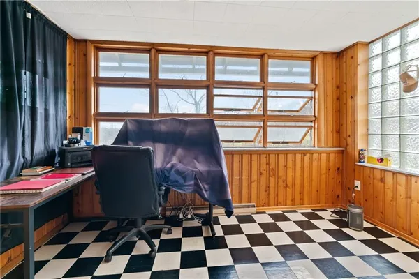 a black and white checkered floor with a black white checkered floor