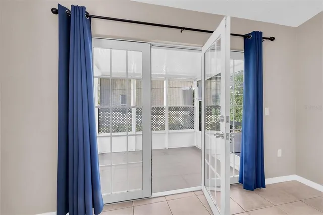 a view of a bathroom with a glass door and shower