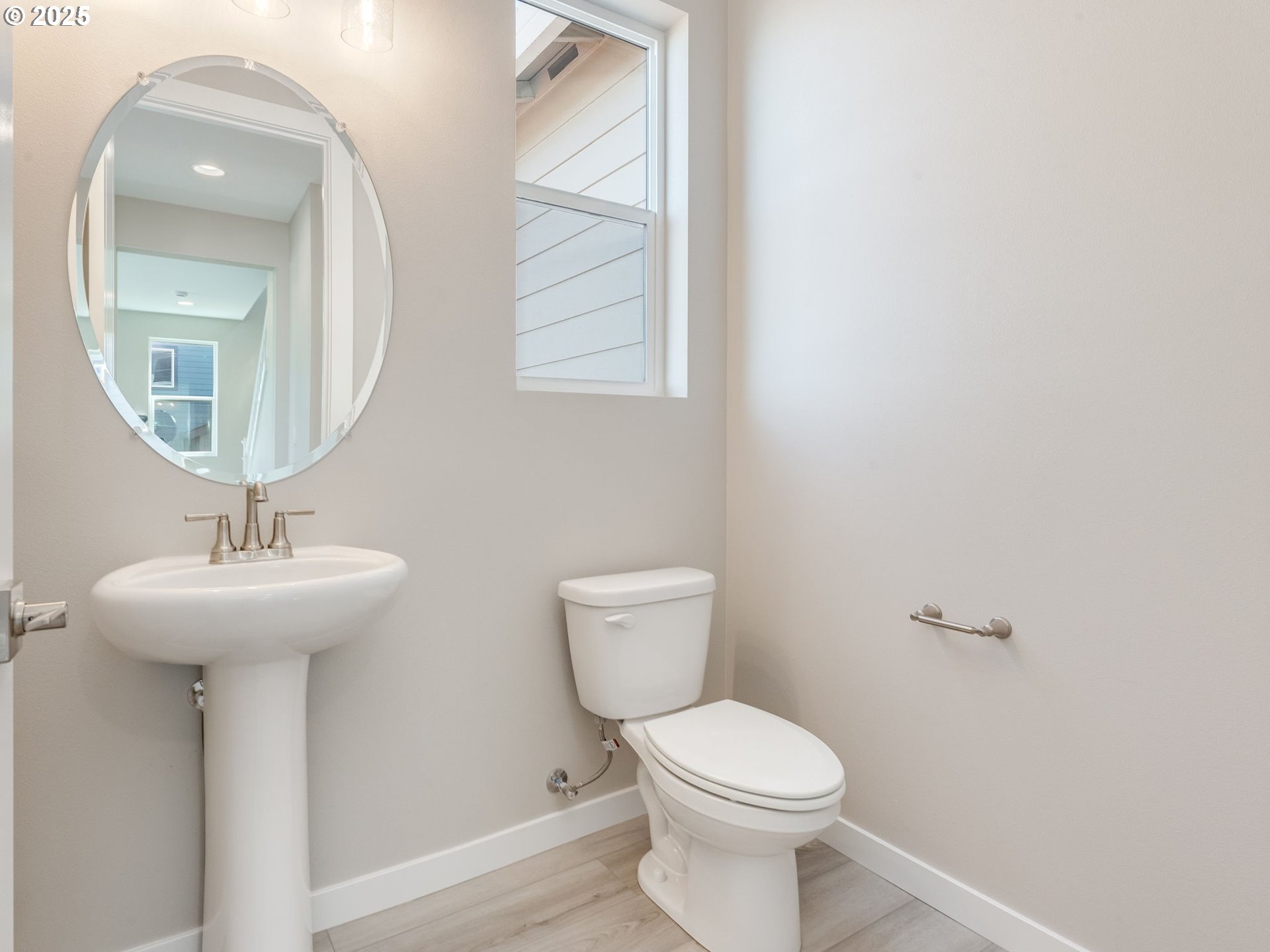 2111 Northeast Ridge Run Lane Estacada, OR 97023 - Photo 25 of 45 a bathroom with a toilet sink and mirror