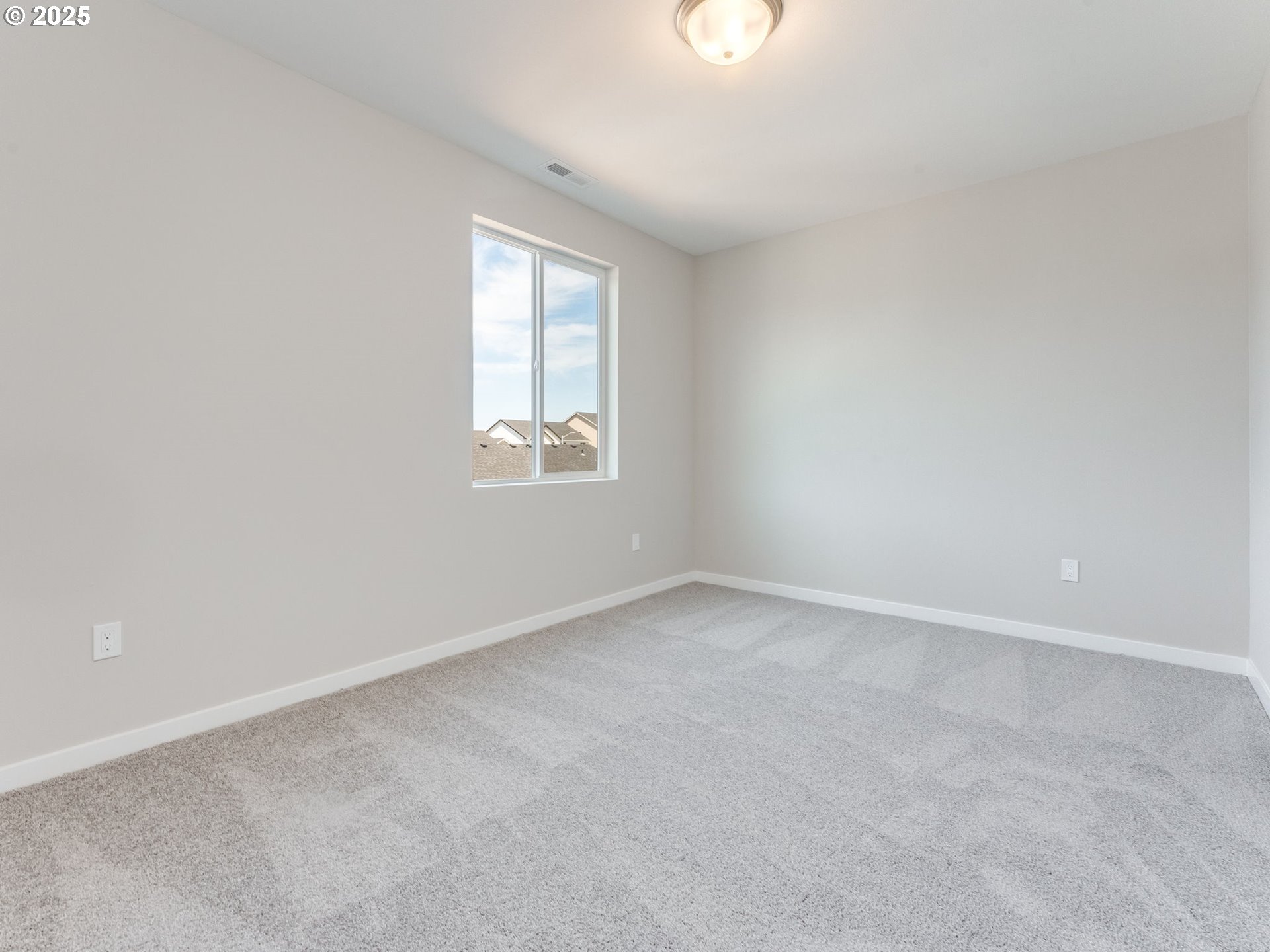 2111 Northeast Ridge Run Lane Estacada, OR 97023 - Photo 30 of 45 an empty room with a window