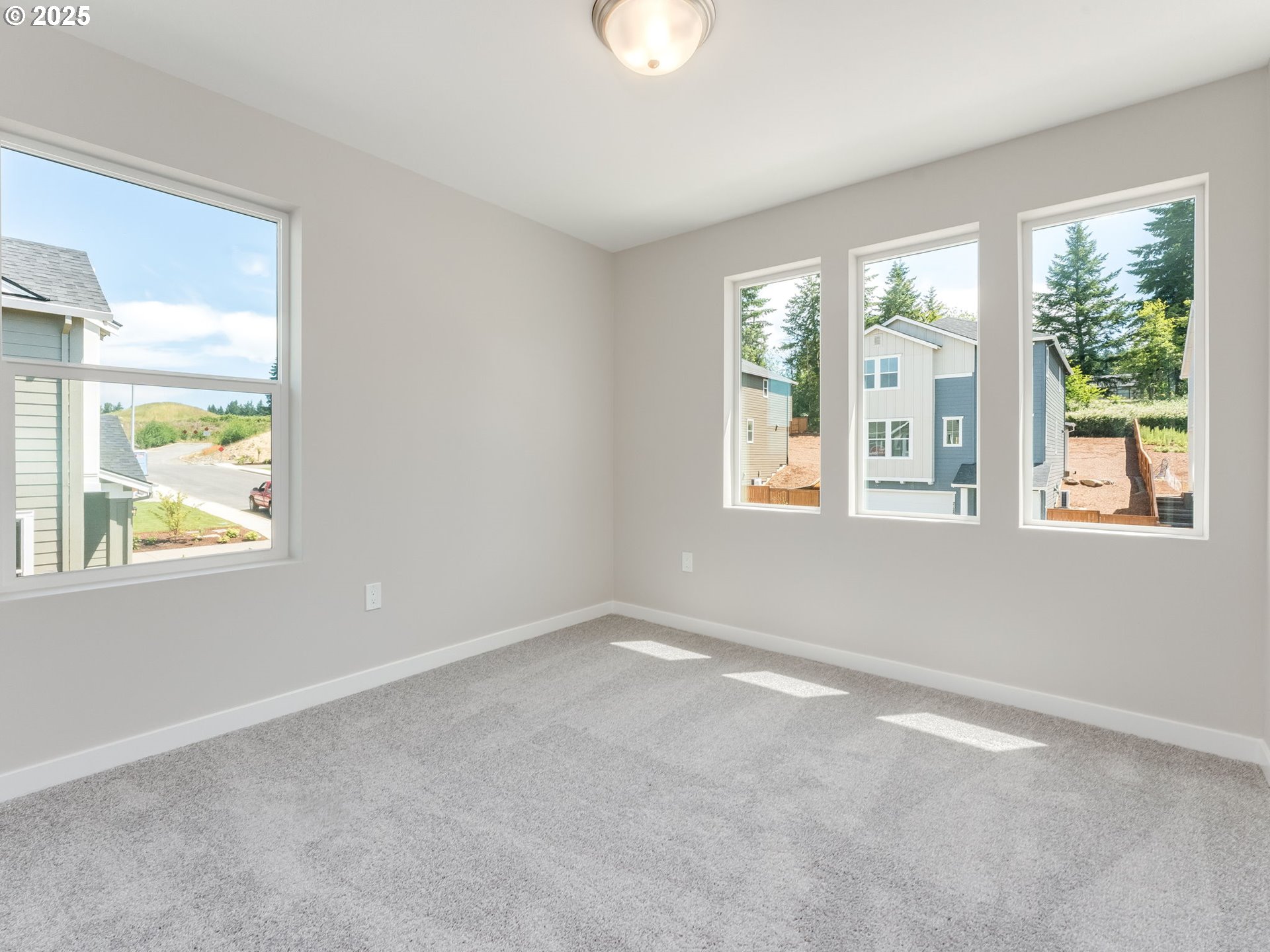 2111 Northeast Ridge Run Lane Estacada, OR 97023 - Photo 33 of 45 a view of an empty room with a window