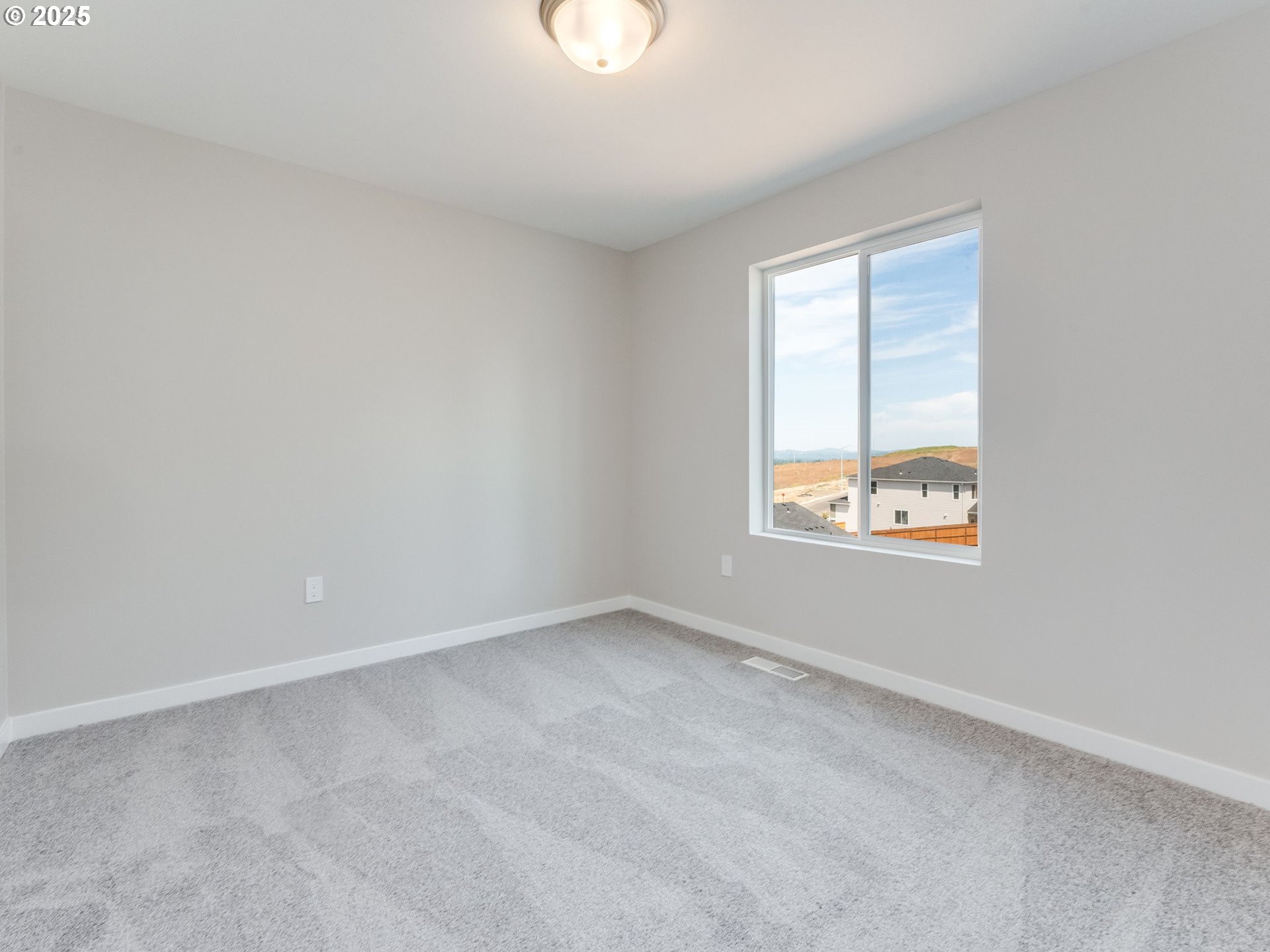 2111 Northeast Ridge Run Lane Estacada, OR 97023 - Photo 37 of 45 an empty room with windows