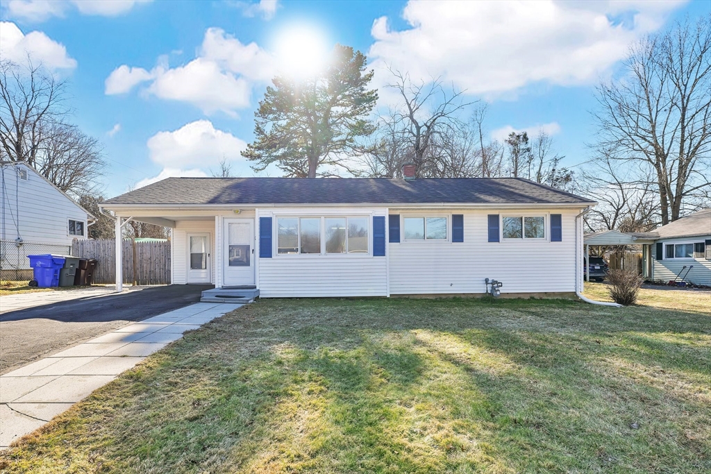 51 Broadleaf Lane Enfield, CT 06082 - Photo 1 of 36 a view of a yard in front of a house