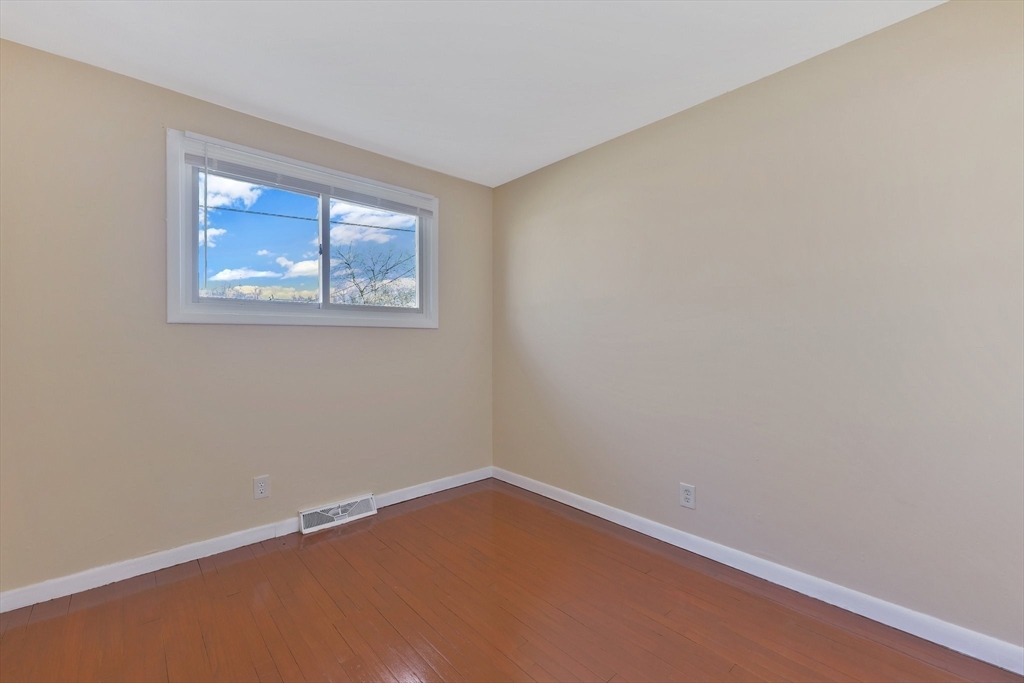 51 Broadleaf Lane Enfield, CT 06082 - Photo 16 of 36 an empty room with a window