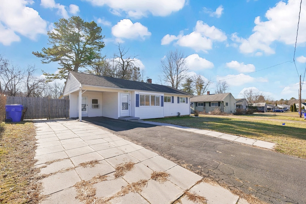 51 Broadleaf Lane Enfield, CT 06082 - Photo 28 of 36 a front view of a house with a yard and lake view