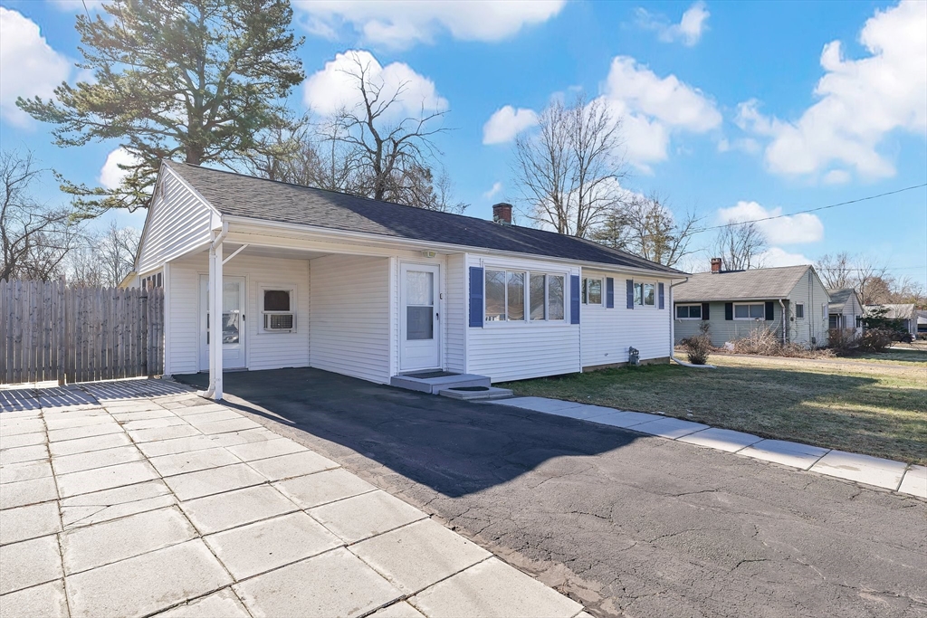 51 Broadleaf Lane Enfield, CT 06082 - Photo 29 of 36 a front view of house with yard