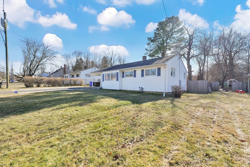 51 Broadleaf Lane Enfield, CT 06082 - Photo 30 of 36 a view of a house with a yard