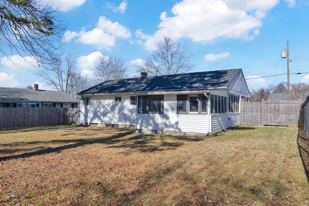 51 Broadleaf Lane Enfield, CT 06082 - Photo 36 of 36 a front view of a house with a yard and garage