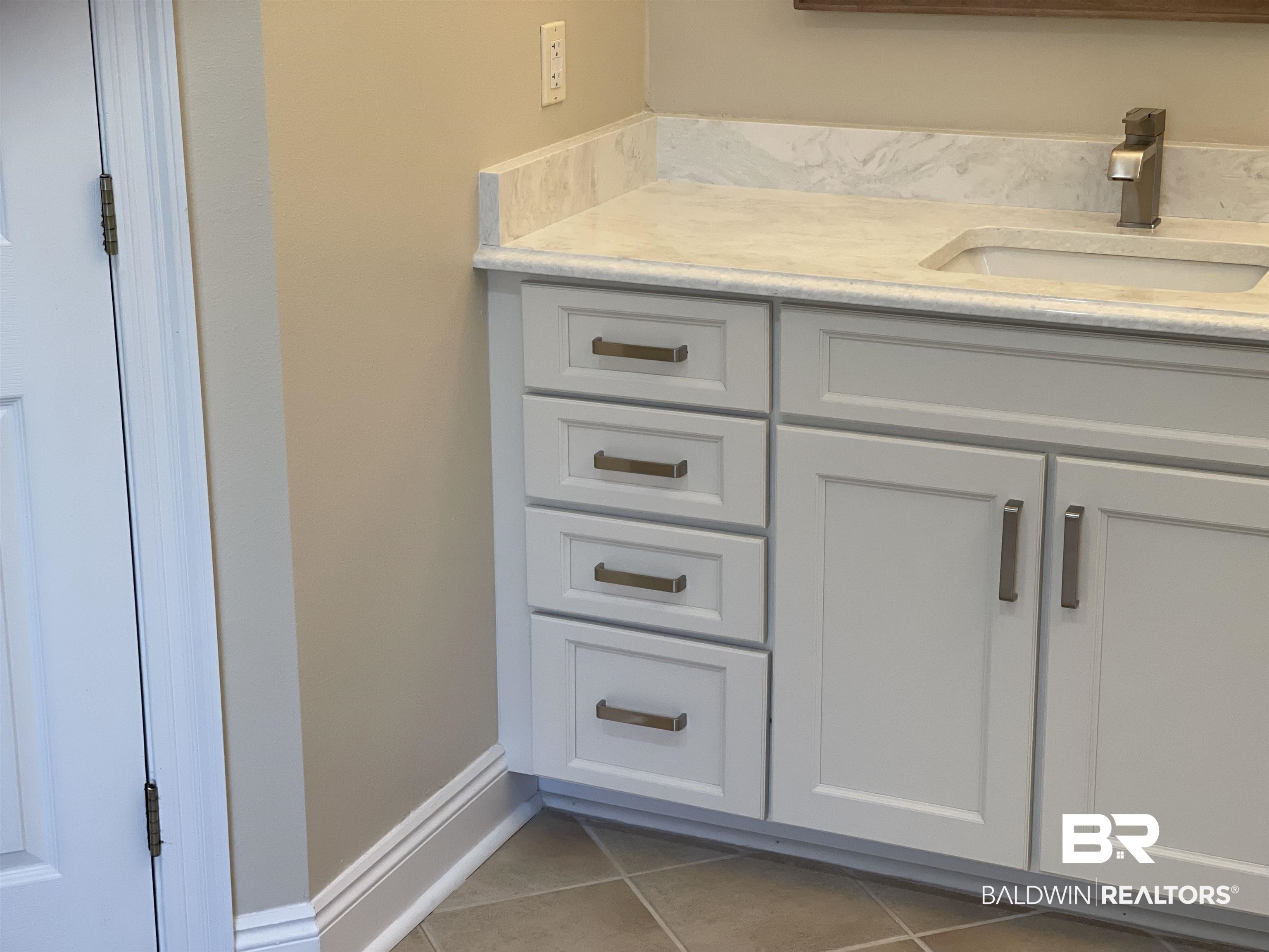 210 Savannah Circle Foley, AL 36535 - Photo 13 of 18 Bathroom featuring tile floors and vanity