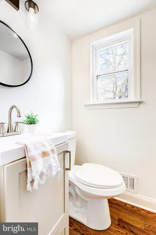 a bathroom with a toilet and a sink