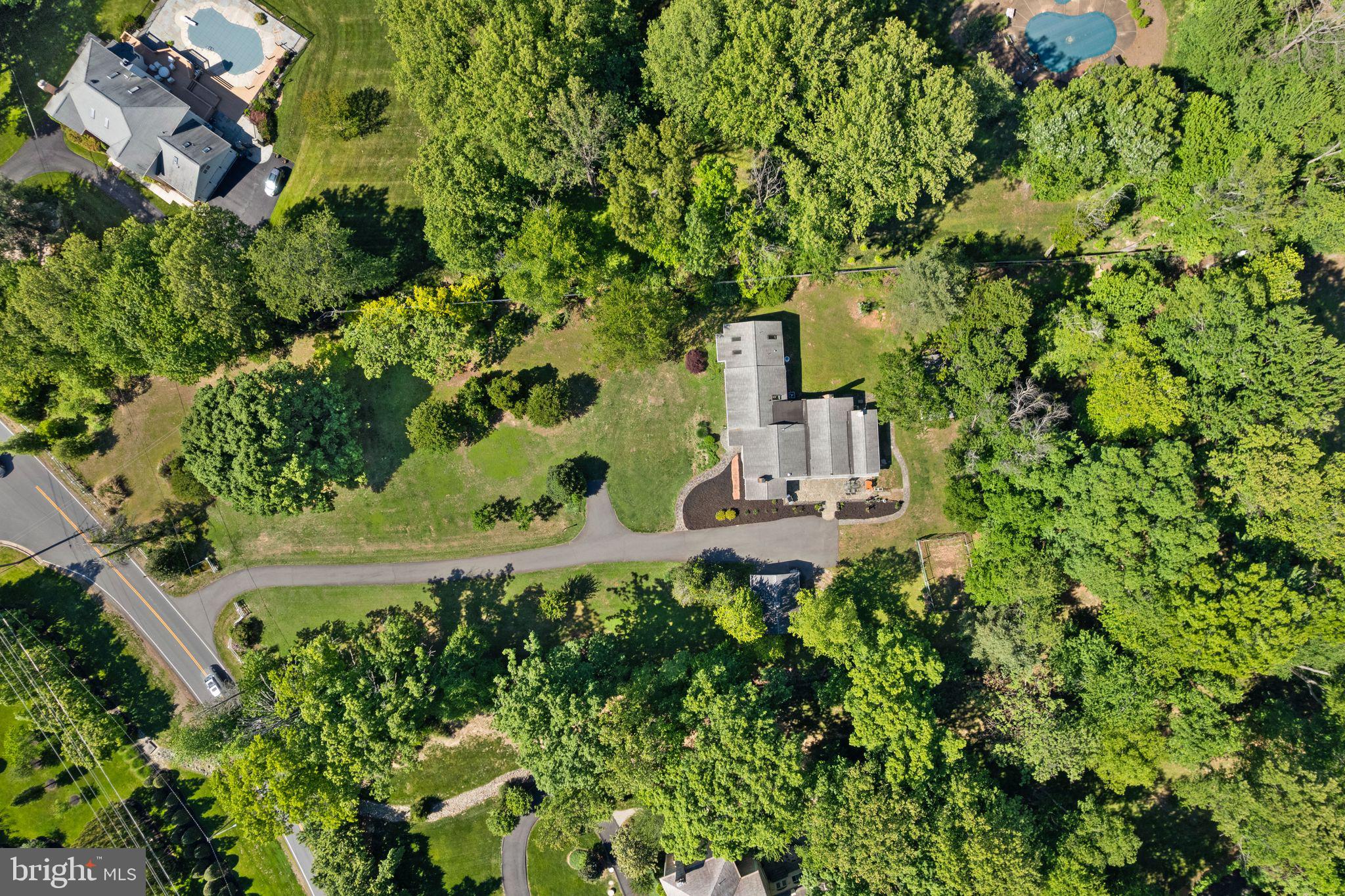 815 Seneca Road Great Falls, VA 22066 - Photo 57 of 61 an aerial view of a house with a yard