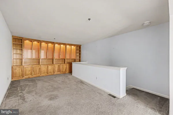 an empty room with a large window