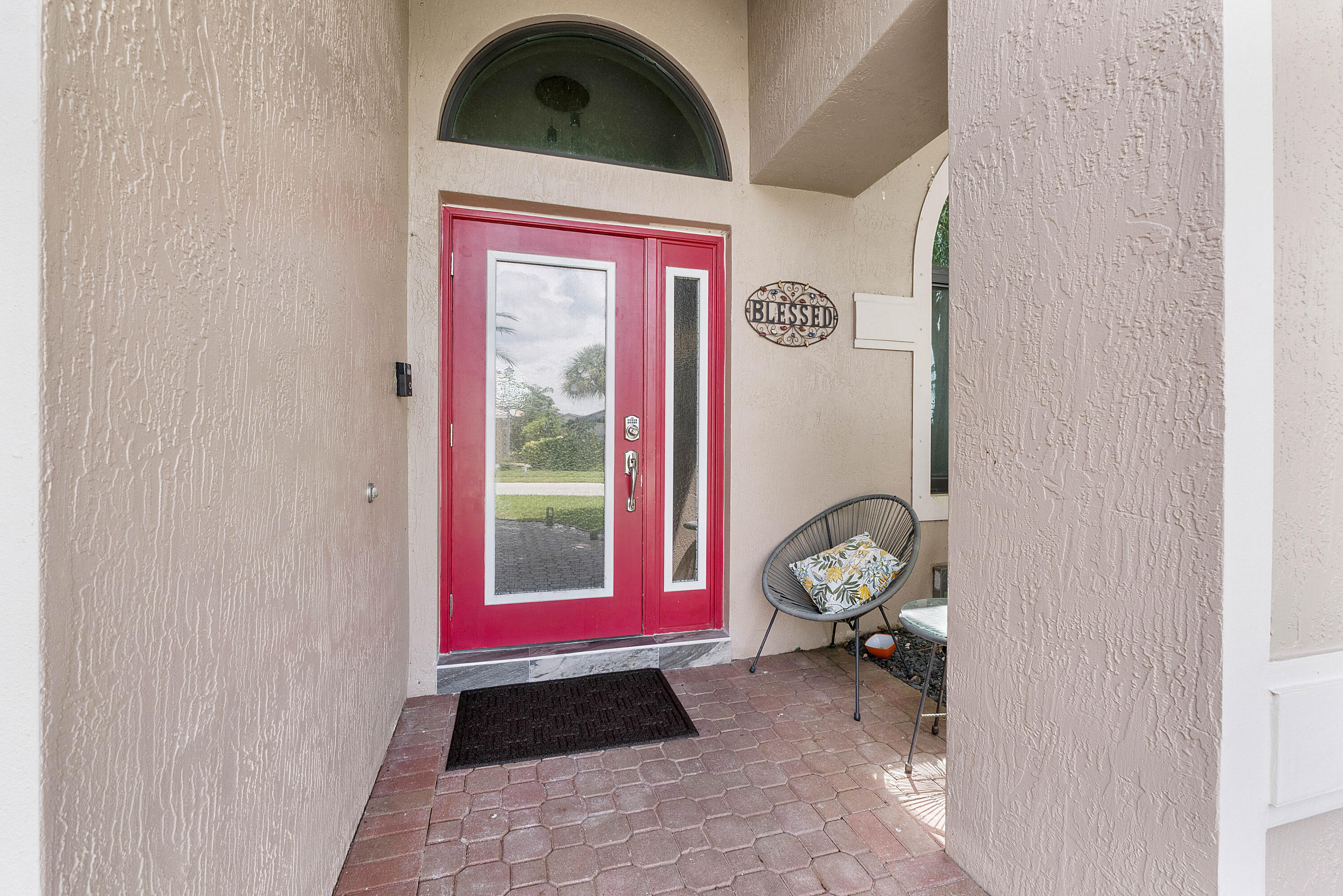 12328 St Simon Drive Boca Raton, FL 33428 - Photo 6 of 52 a view of front door with glass door
