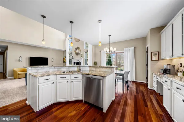 a room with wooden floor and chair