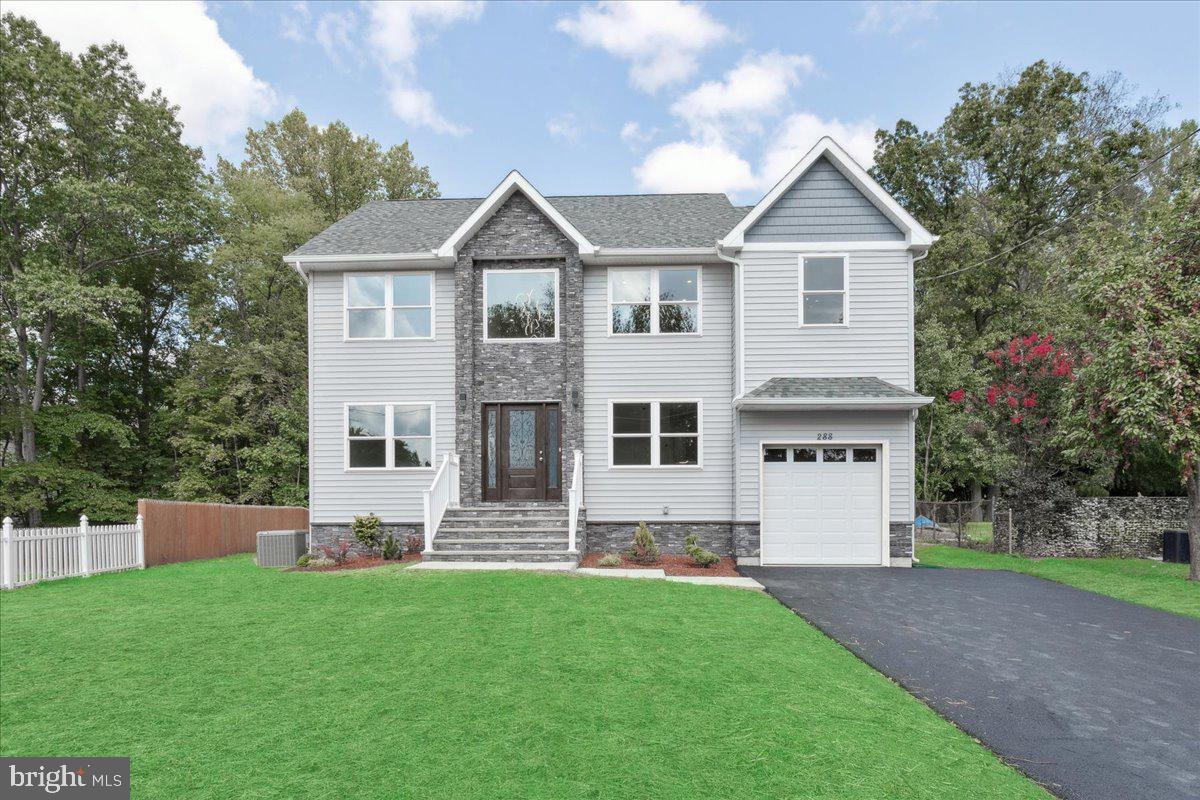 288 Clamer Road Ewing, NJ 08628 - Photo 2 of 33 a front view of a house with a yard