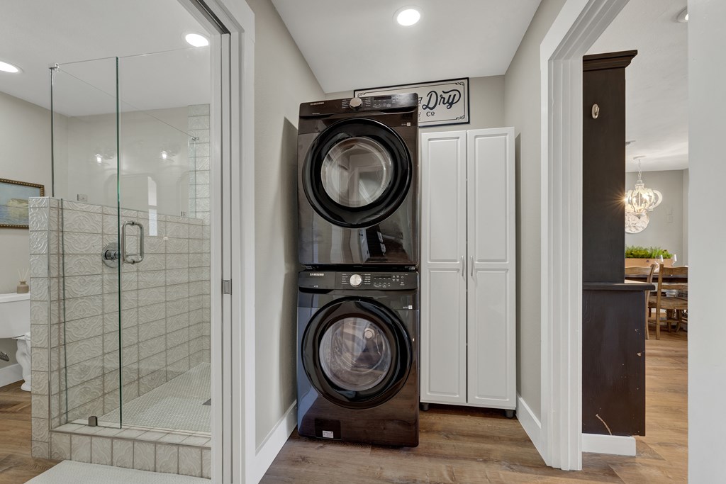 113 Weitz Road Fredericksburg, TX 78624 - Photo 16 of 50 a view of a hallway with washer and dryer
