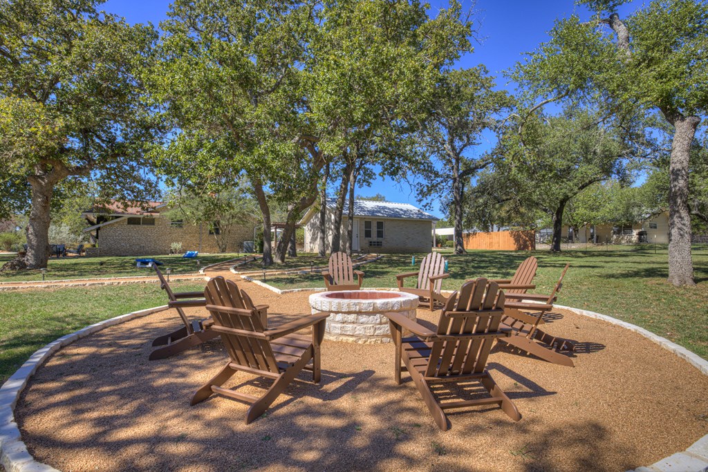 113 Weitz Road Fredericksburg, TX 78624 - Photo 24 of 50 a view of backyard with outdoor seating ad green space