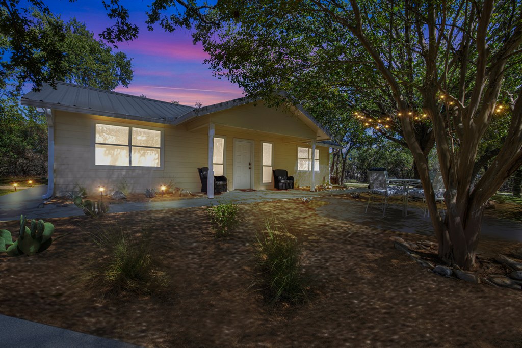 113 Weitz Road Fredericksburg, TX 78624 - Photo 29 of 50 a front view of a house with a yard