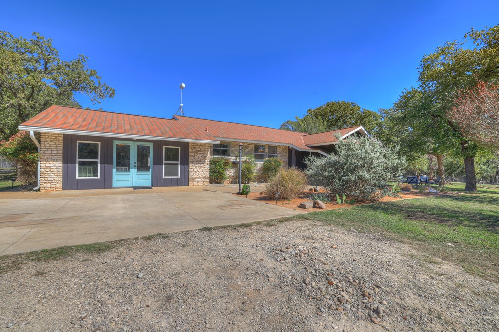 113 Weitz Road Fredericksburg, TX 78624 - Photo 3 of 50 a view of a house with a yard