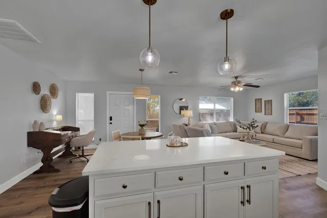 a bathroom with a double vanity sink