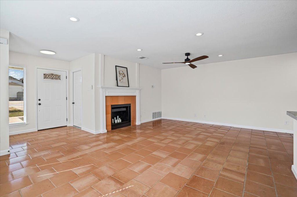303 Fantail Loop, Unit A Austin, TX 78734 - Photo 9 of 28 a view of a livingroom with a fireplace