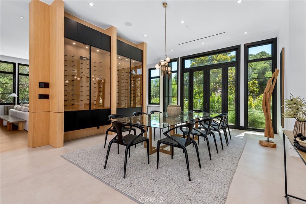 23650 Long Valley Road Hidden Hills, CA 91302 - Photo 15 of 57 a view of a patio with table and chairs