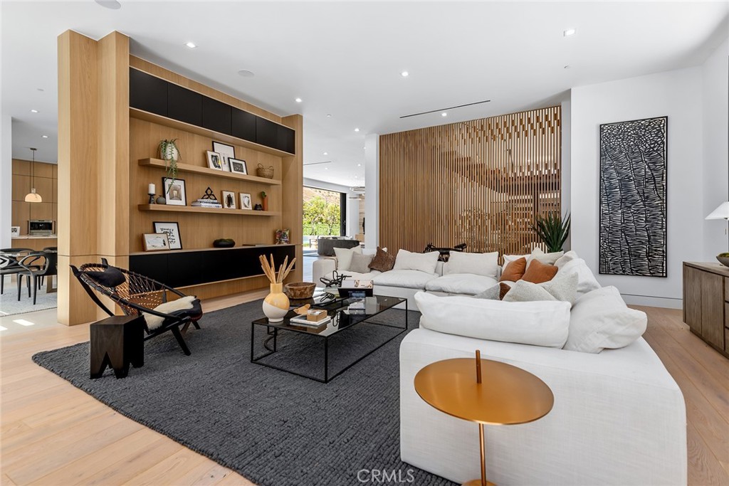 23650 Long Valley Road Hidden Hills, CA 91302 - Photo 17 of 57 a living room with furniture and a large window