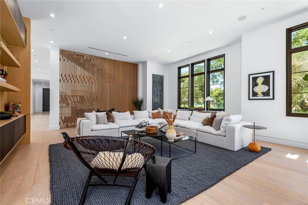 23650 Long Valley Road Hidden Hills, CA 91302 - Photo 22 of 57 a living room with furniture and a large window