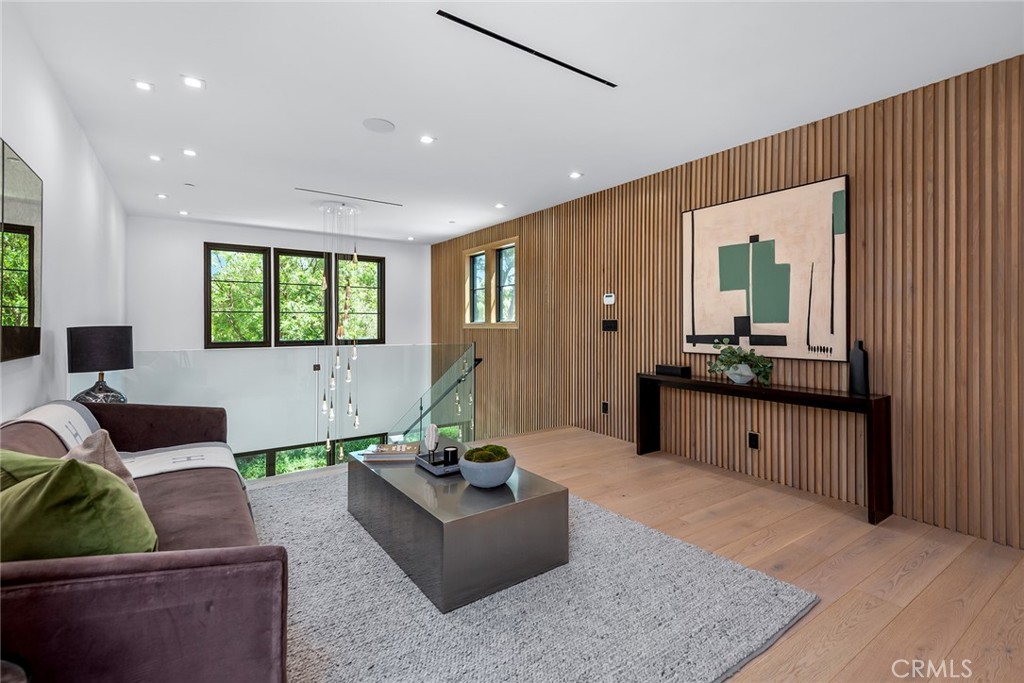 23650 Long Valley Road Hidden Hills, CA 91302 - Photo 26 of 57 a living room with furniture and a large window